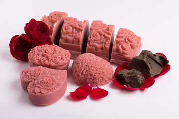 soap handmade with roses on a white background