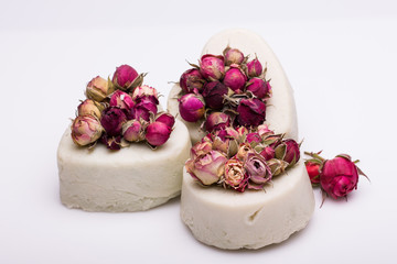 soap handmade with roses on a white background