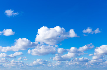Naklejka na ściany i meble Blue sky background with clouds . Sky with clouds