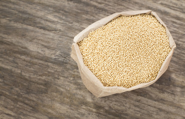 Amaranth seeds on the wooden table - Amaranthus