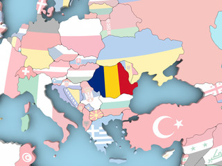 Map of Romania with flag on globe