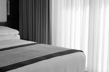 Modern bedroom interior in the hotel. Black and white photography