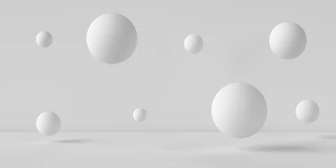 Suspended balls on a white background. 3D image rendering.