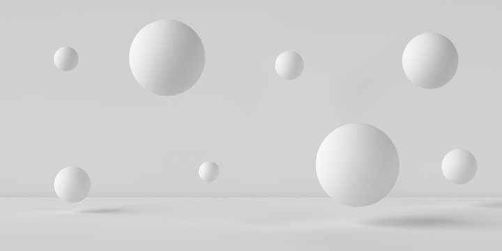 Suspended balls on a white background. 3D image rendering. © Whales Factory