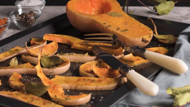 Rustic roasted pumpkin in a cast iron skillet.