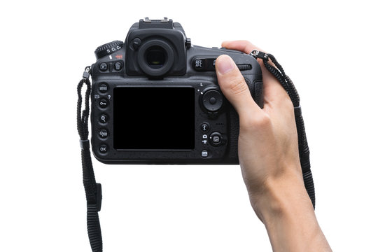DSLR digital camera in hand isolated on white background