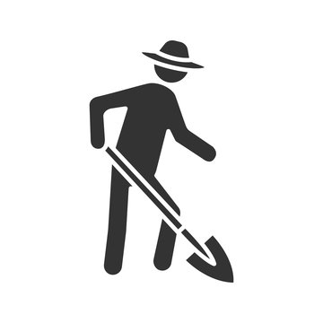 Farmer working with shovel glyph icon