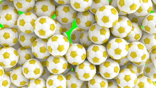 Animated simple soccer balls with plain yellow and white material falling and tumbling filling up container against green background. Top camera view. 
