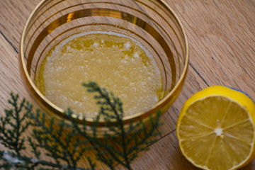 Homemade lip scrub made out of honey, olive oil and sugar 
