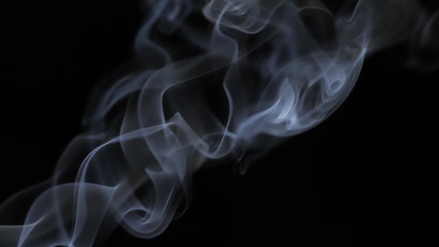 White tobacco smoke line cloud on black background 4k slow-motion video with copy space. Smoking wave floating steaming: cigarette, cigar, vaping, pipe. Nicotine addiction