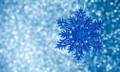  Defocused Abstract Blurred Shiny Christmas Blue Background with Sparkles    Decoration Happy New Year  Festive Holiday  with Light Effect Boke Space for text Selective focus