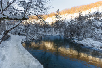 Fototapeta na wymiar Plitvice lakes during winter with high level of snow