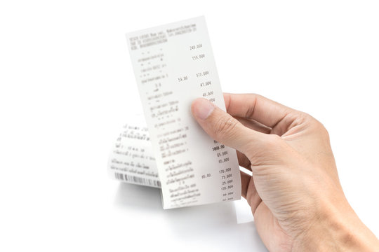Grocery shopping list or receipt in hand - money account management concept