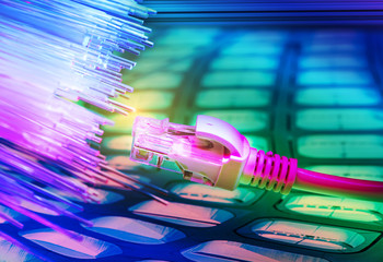 network cables closeup with fiber optical background
