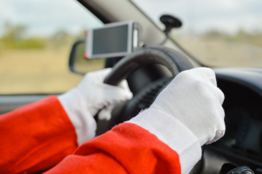 Busy holiday time for Santa Claus driving vehicle carrying delivering presents celebrating joy happiness. Close up on person providing quick transportation service. Rushing people solution concept.
