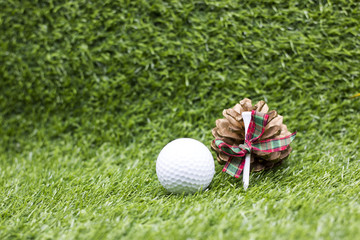 golf and tee with pine cone for X'mas
