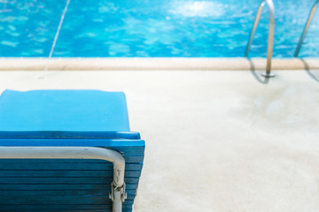 Relaxing pool bed beside swimming pool