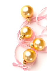 Christmas balls with satin ribbon on white background
