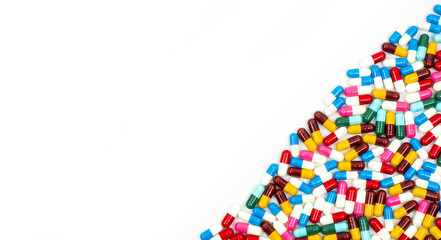 Colorful of antibiotic capsules pills isolated on white background with copy space. Drug resistance concept. Antibiotics drug use with reasonable and global healthcare concept.