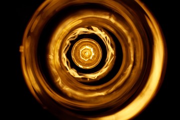 Abstract view of a light reflecting on surrounding glass