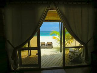 View from hotel room into paradise, Maldives - tropical heaven and peace.