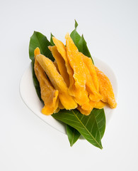 Dried Mango or Dried Mango slices on a background.