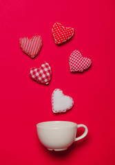 White cup and heart shapes