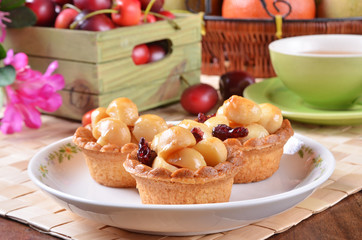 Macadamia nuts tart on white plate  