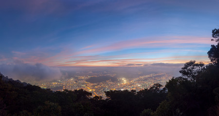 Aerial view  of Caracas city, at sunset, from a lookout in Avila mountain, in Venezuela.