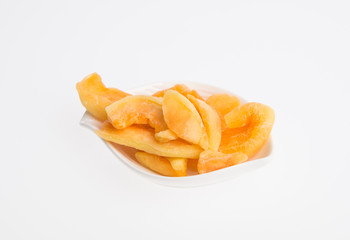 dried melon or dried fruits on a background.