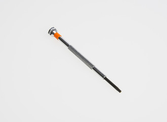screwdrivers or metal small screwdrivers on background.