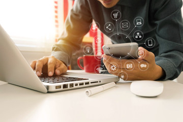 close up of hand using tablet ,laptop, and holding smartphone online banking payment communication...