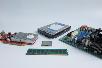 Computer Hardware, hard drive, cpu, ram, vga card, and Motherboard, On a white background