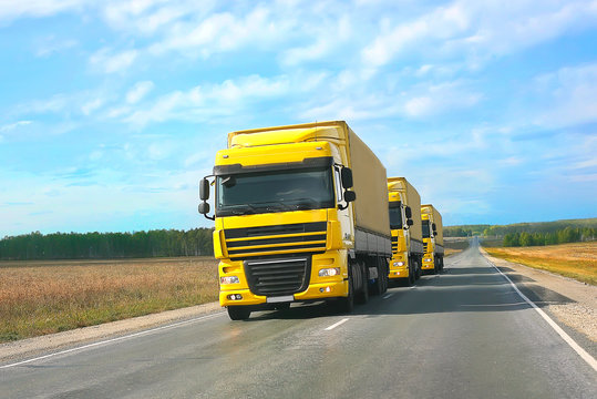 escort of yellow trucks