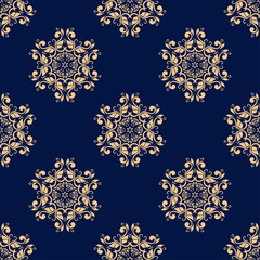 Golden floral seamless pattern on blue background