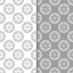 White and gray set of floral seamless patterns