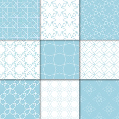 Blue and white geometric ornaments. Collection of seamless patterns
