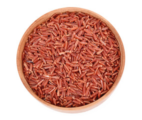 Fototapeta na wymiar Top view of red rice isolated on white background