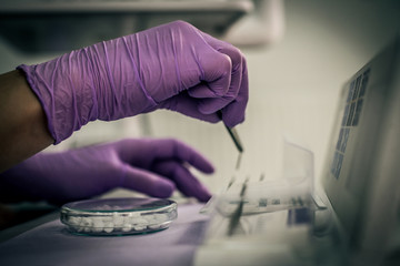 Dentist working with dental material .