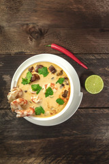 Tom Yam, traditional Thai soup with shrimps and mushrooms