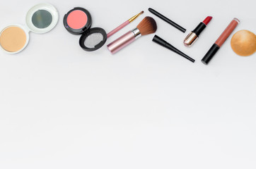 Cute feminine stuff on white background, top view Cosmetics set Top view White table