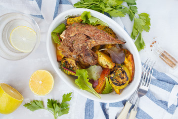 Grilled lamb with baked vegetables