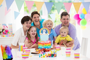 Obraz na płótnie Canvas Kids birthday party. Family celebration with cake.