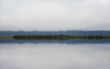 Obraz na płótnie Canvas Landscape with a lake Lovozero and tundra forest