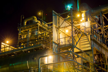 one building at  chemical plant at night