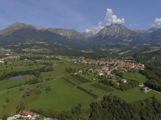 Fototapeta na wymiar aerial view of village in the mountains, summer, sunny,