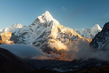Fototapeta na wymiar Ama Dablam (6856m) peak near the village of Dingboche in the Khumbu area of Nepal, on the hiking trail leading to the Everest base camp.