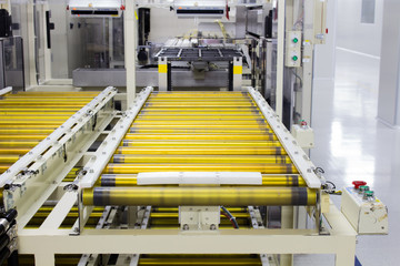 The conveyor chain, and conveyor belt on production line in clean room.