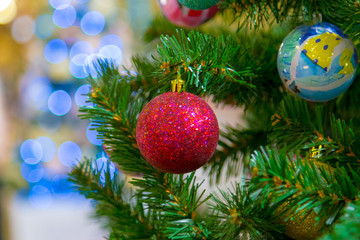 Christmas decorations on the branches of fir tree