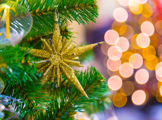 Christmas decorations on the branches of fir tree